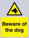 beware-of-the-dog-with-dog-warning-symbol~